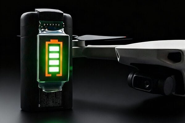 A drone charging hub with one light turned solid green