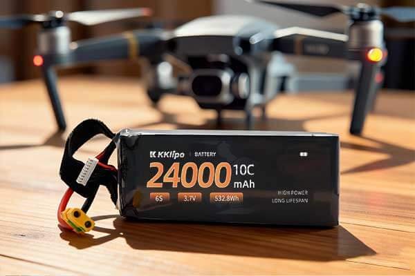 An infographic showing a battery's capacity being divided by a device's power consumption to equal runtime.